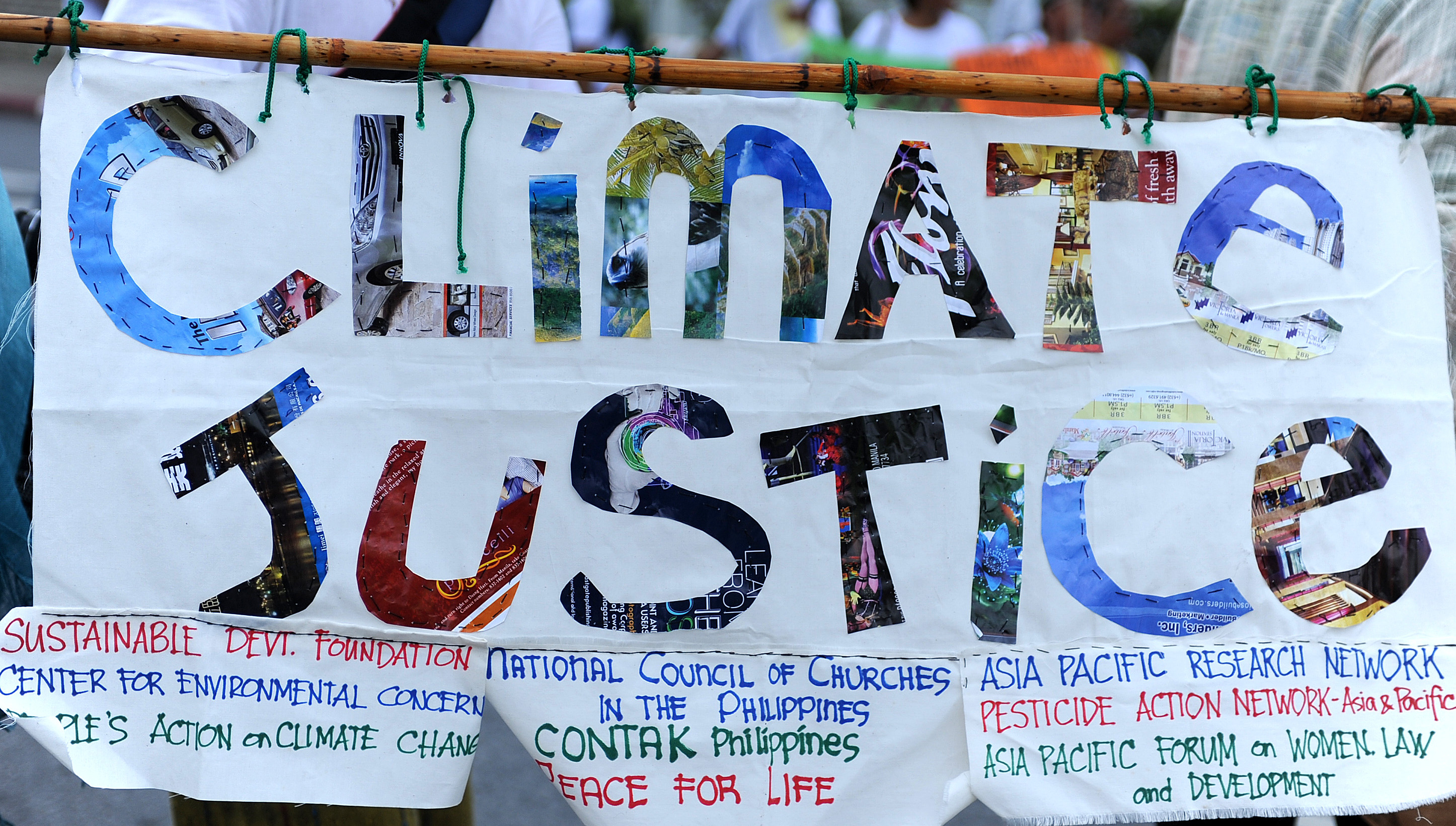climate justice banner - Photo credit: Columnf.com
